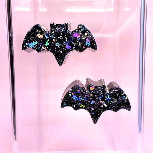 Jumping spider bat ledges in glitter black variation placed inside the enclosure
