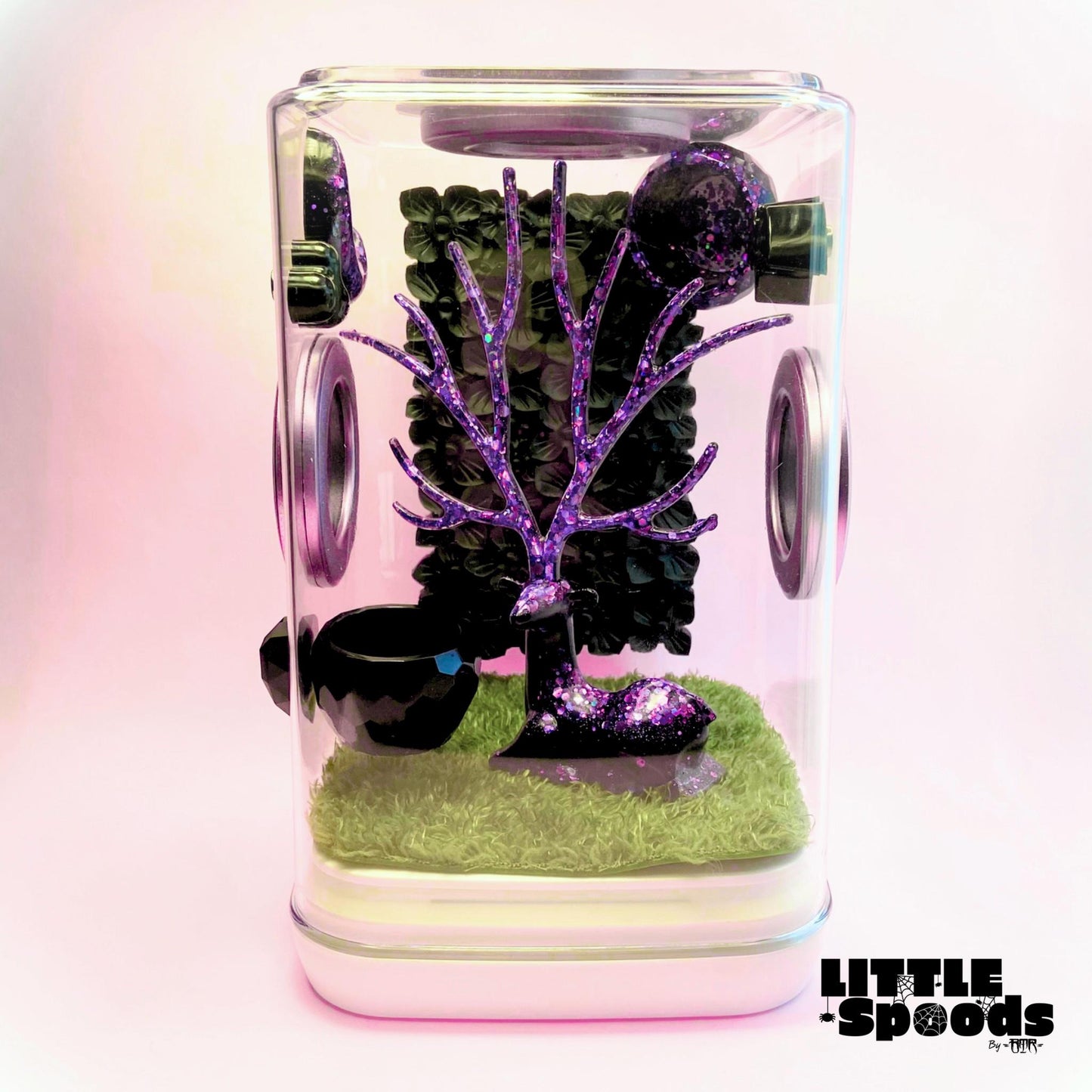 Artificial moss mat installed inside a jumping spider enclosure