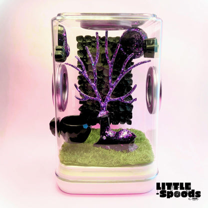 Artificial moss mat installed inside a jumping spider enclosure