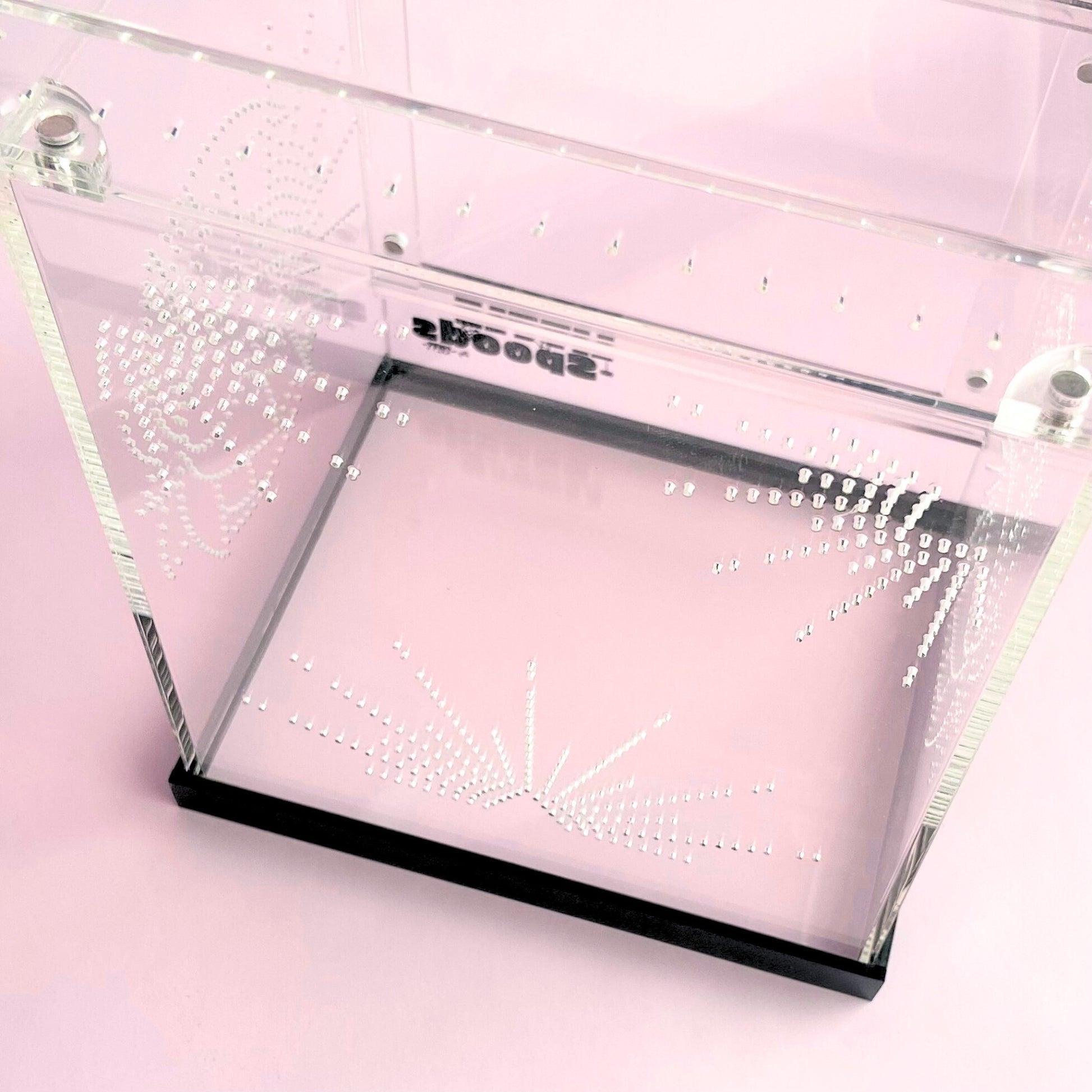 Decorative rear ventilation pattern on the Large Imaginarium acrylic enclosure