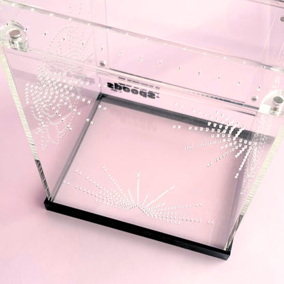 Decorative rear ventilation pattern on the Large Imaginarium acrylic enclosure