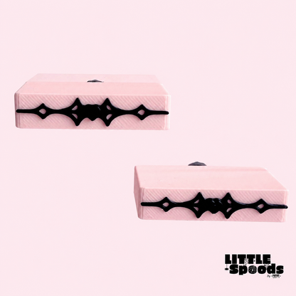 Two pink magnetic Vampirella jumping spider ledges with gothic black detailing