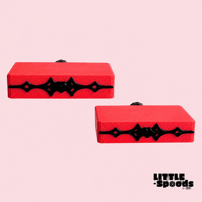 Red Vampirella gothic jumping spider ledges with black decorative detailing