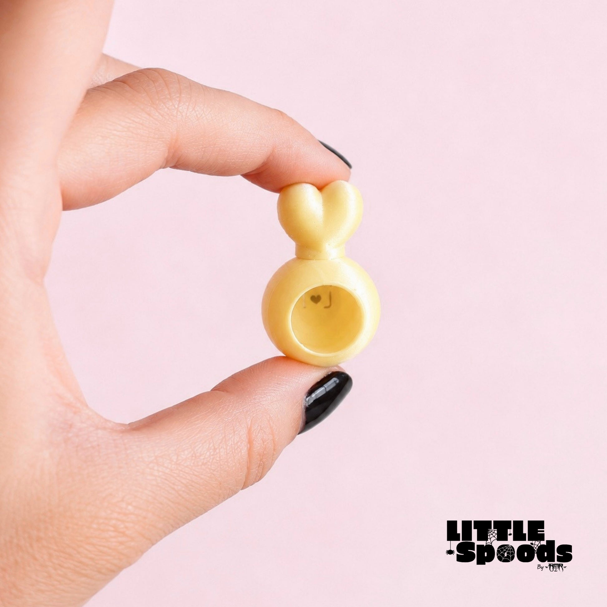 Small magnetic jumping spider hide in yellow color variation designed for slings and juveniles