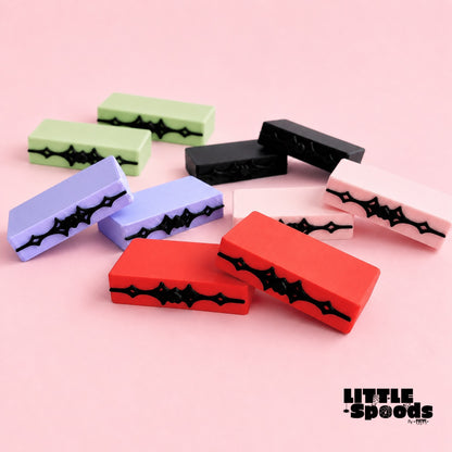 Vampirella gothic jumping spider ledges in green purple black red and pink