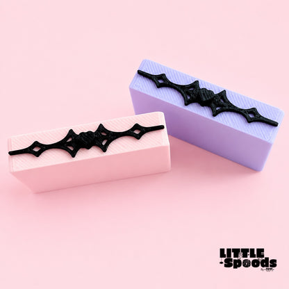 Pink and purple Vampirella gothic jumping spider ledges with black gothic detailing